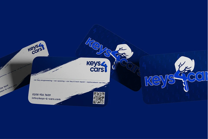 Keys 4 Cars business cards in blue and white with the hand and key logo