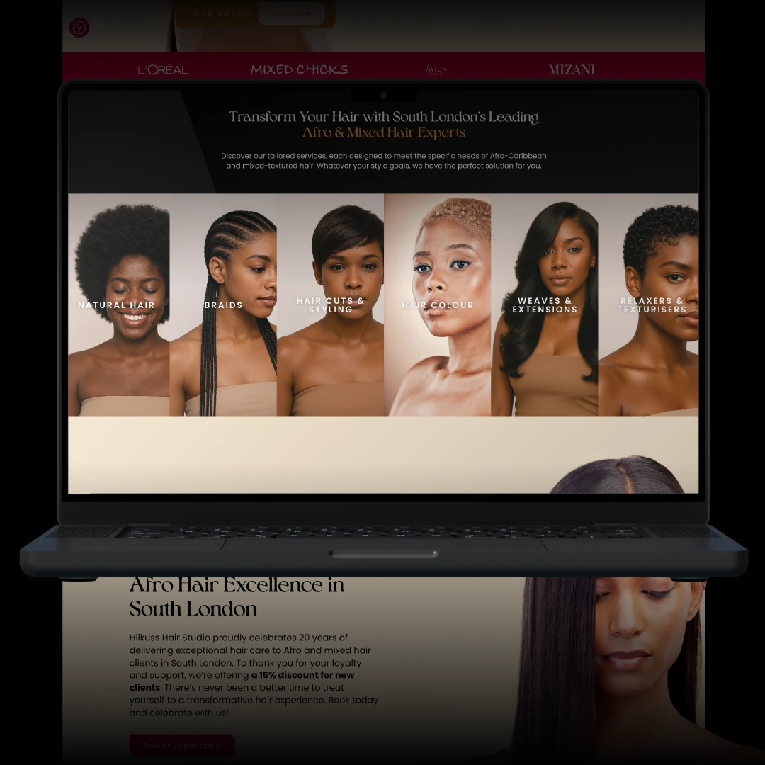 Hiikuss Hair Studio home page on a laptop